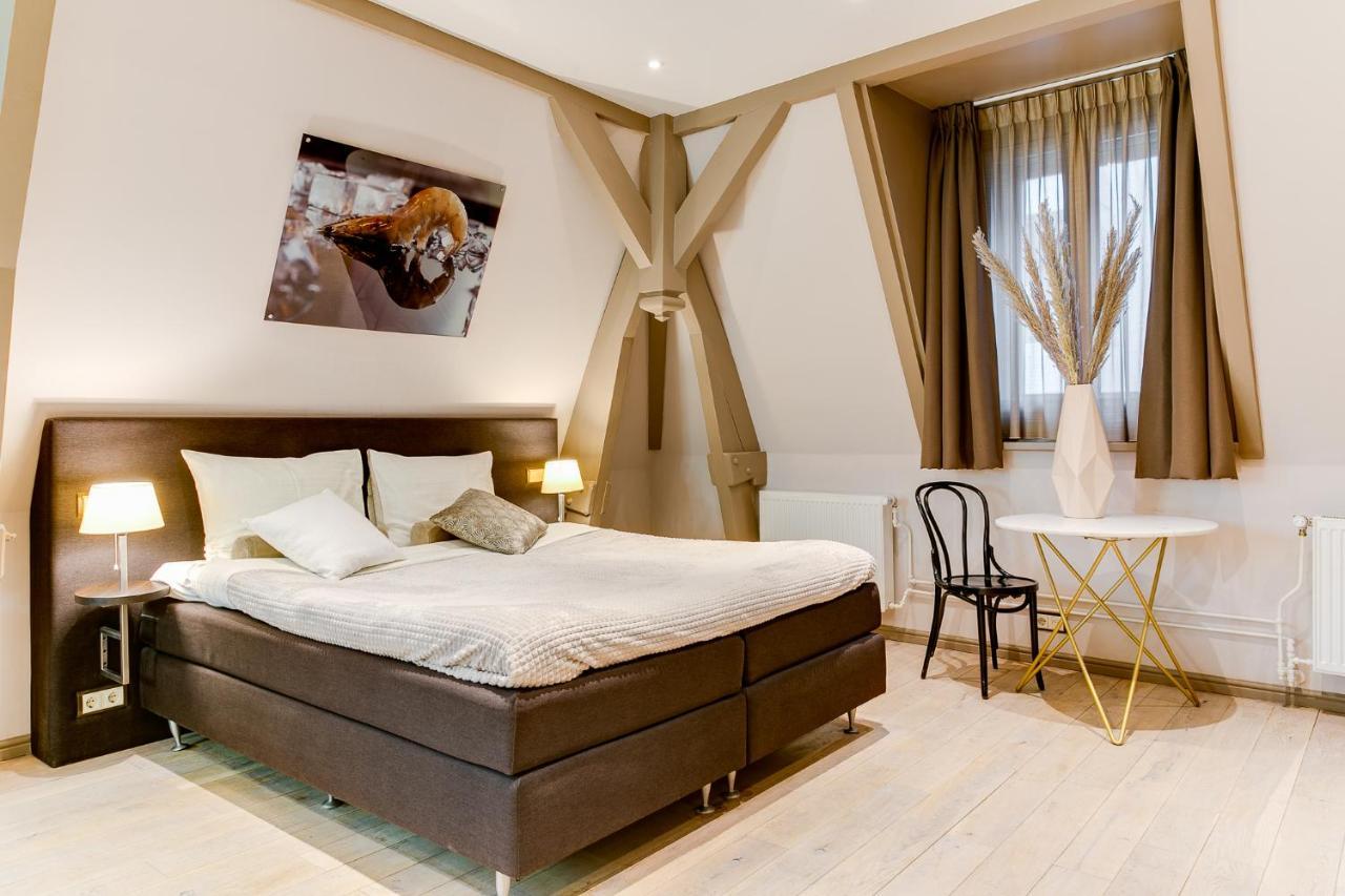 Brasss Hotel Suites Haarlem Exterior photo A room at the hotel