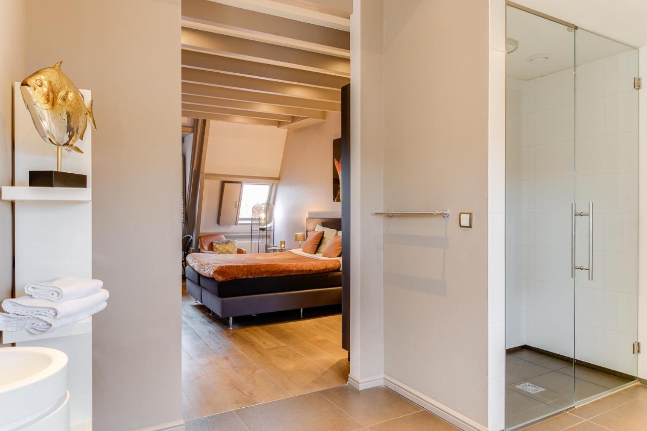 Brasss Hotel Suites Haarlem Exterior photo A sliding door
