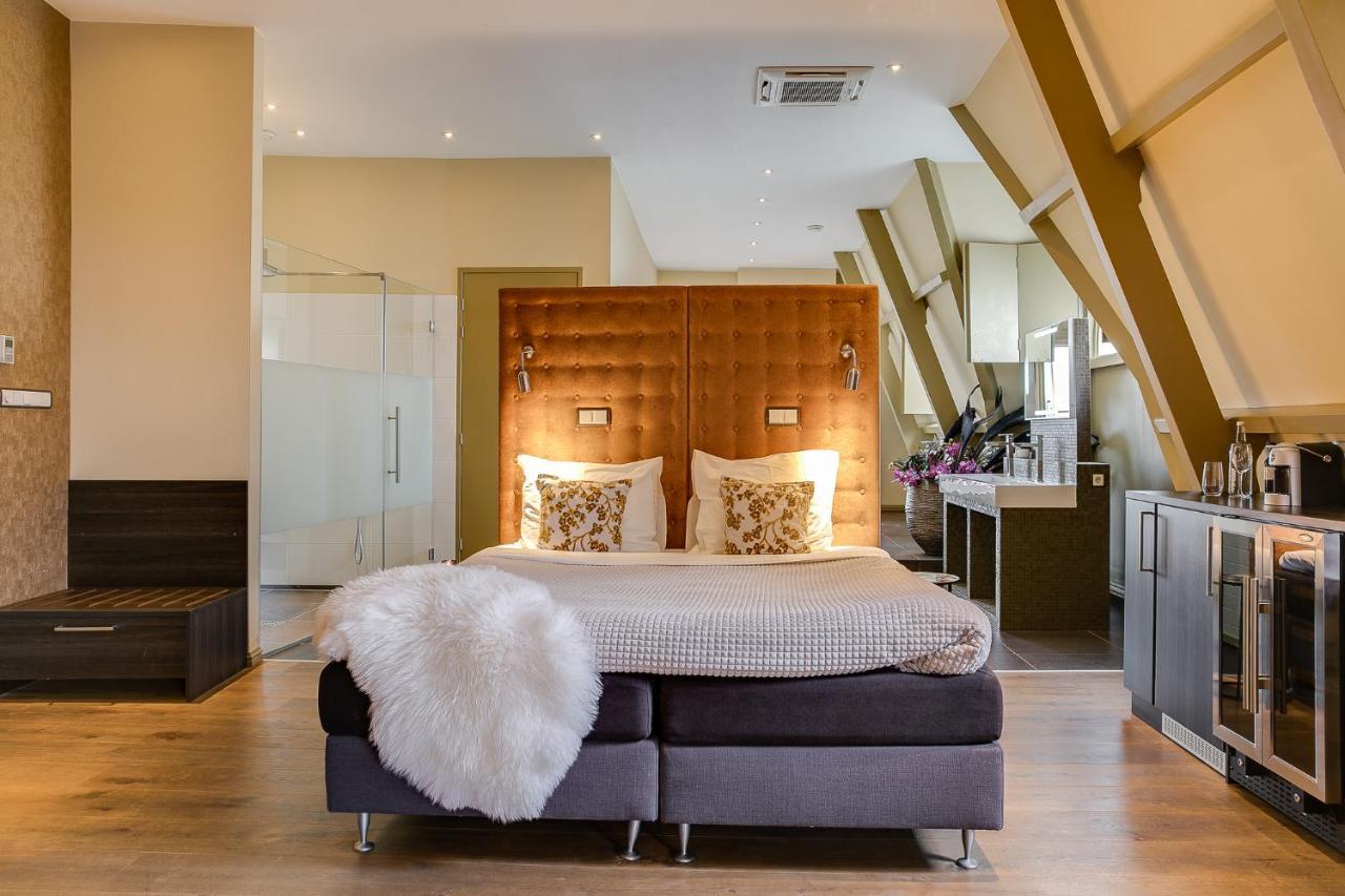 Brasss Hotel Suites Haarlem Exterior photo A bedroom at the hotel
