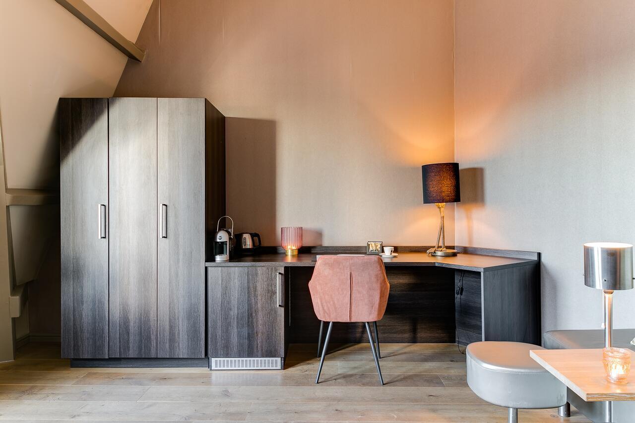 Brasss Hotel Suites Haarlem Exterior photo A typical studio apartment
